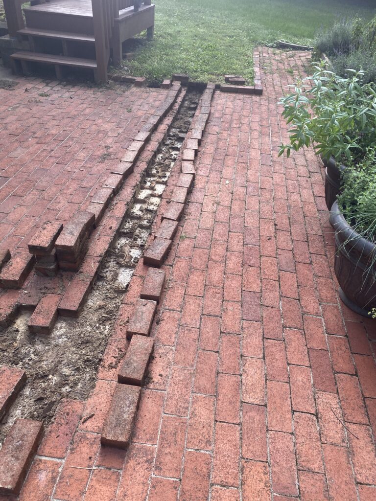brick removal for drainage | once & done