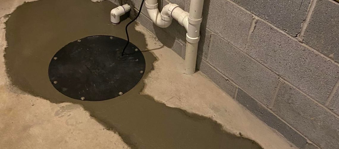 Sump Pump draining water | Sump Pumps | Once and Done Waterproofing | WV, MD, NJ, PA