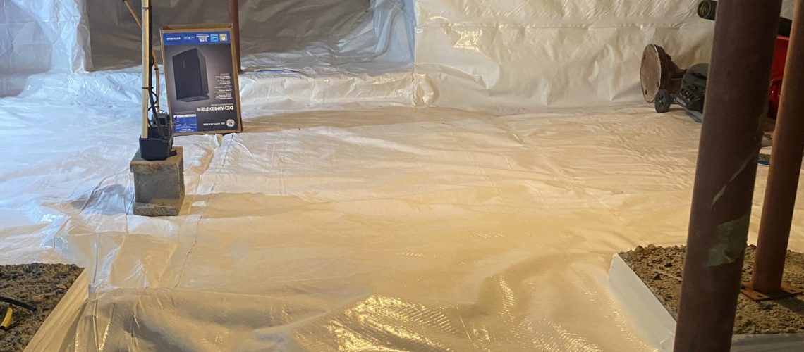 waterproofing material installed in subfloor | once & done